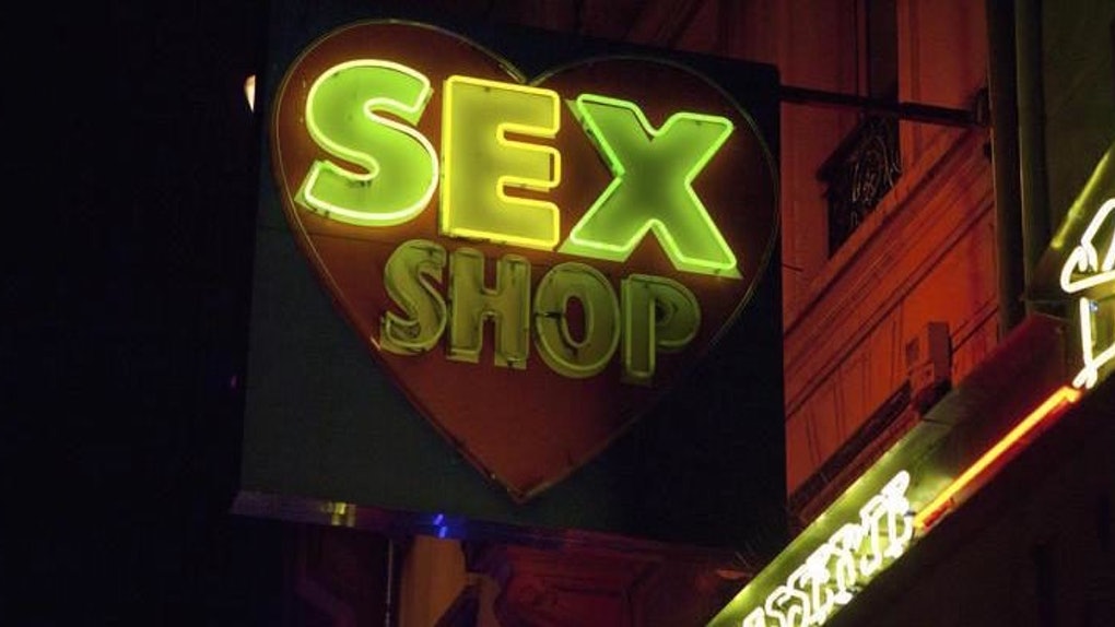 Is it awkward in sex stores? Photo of a store from with neon sex shop sign