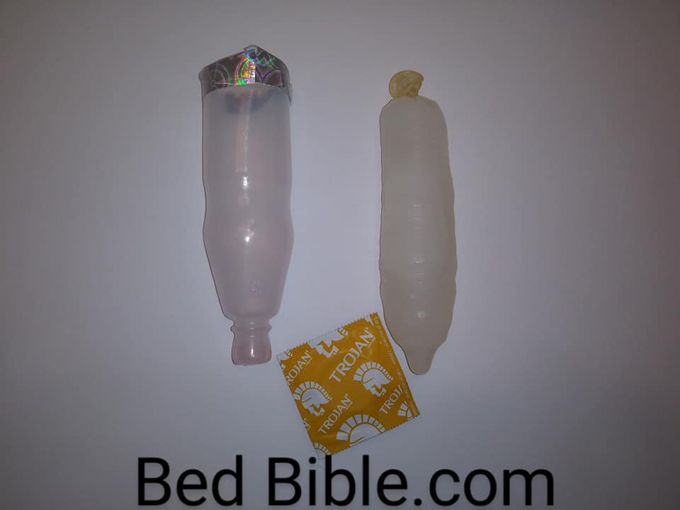 DIY Ice Dildos. Photo of an ice dildo, Trojan Ultra Ribbed Condom and a Kool-Aid Cooler bottle