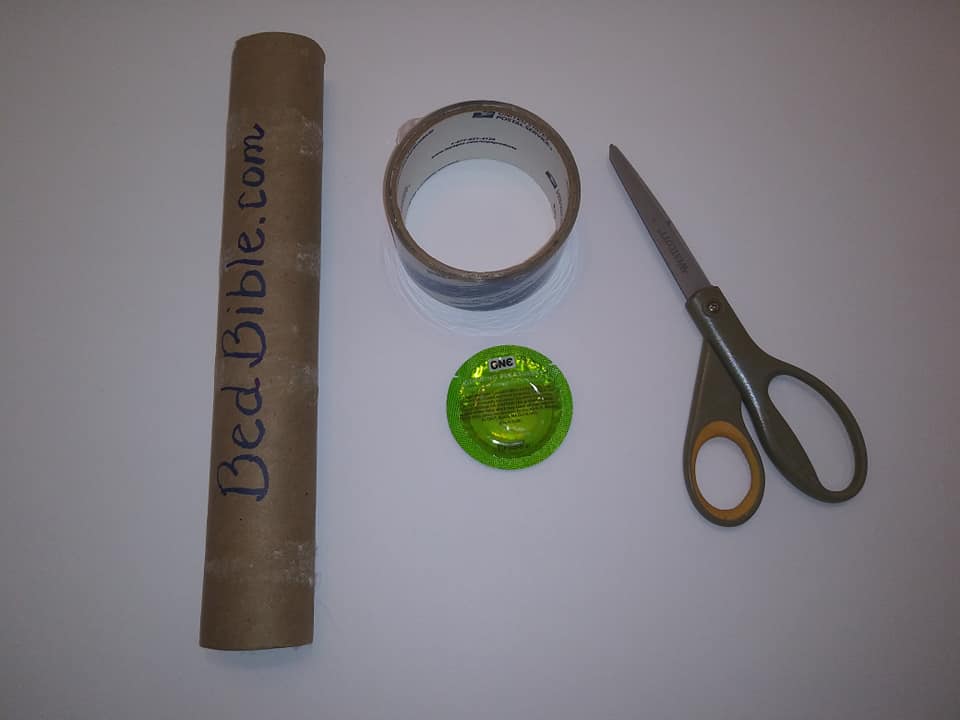 How to Make an Ice Dildo in 6 Easy Steps. Photo showing a cardboard tube, roll of tape, scissors and a condom