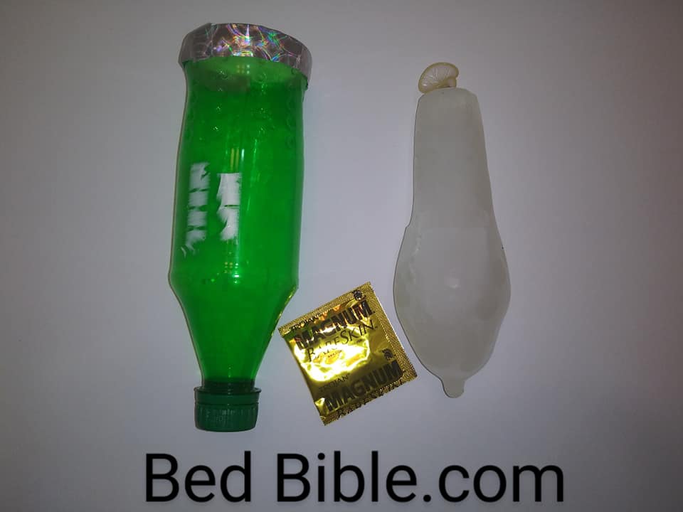 DIY Ice Dildos. Photo of a larger ice dildo, a soda bottle with the bottom cut out and a Magnum condom
