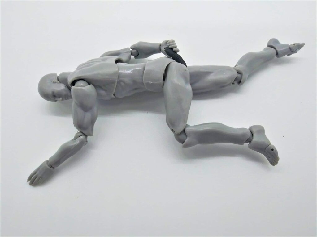 Positions for using a dildo for men: male figure lying on his side with one arm behind him using a dildo for anal penetration.