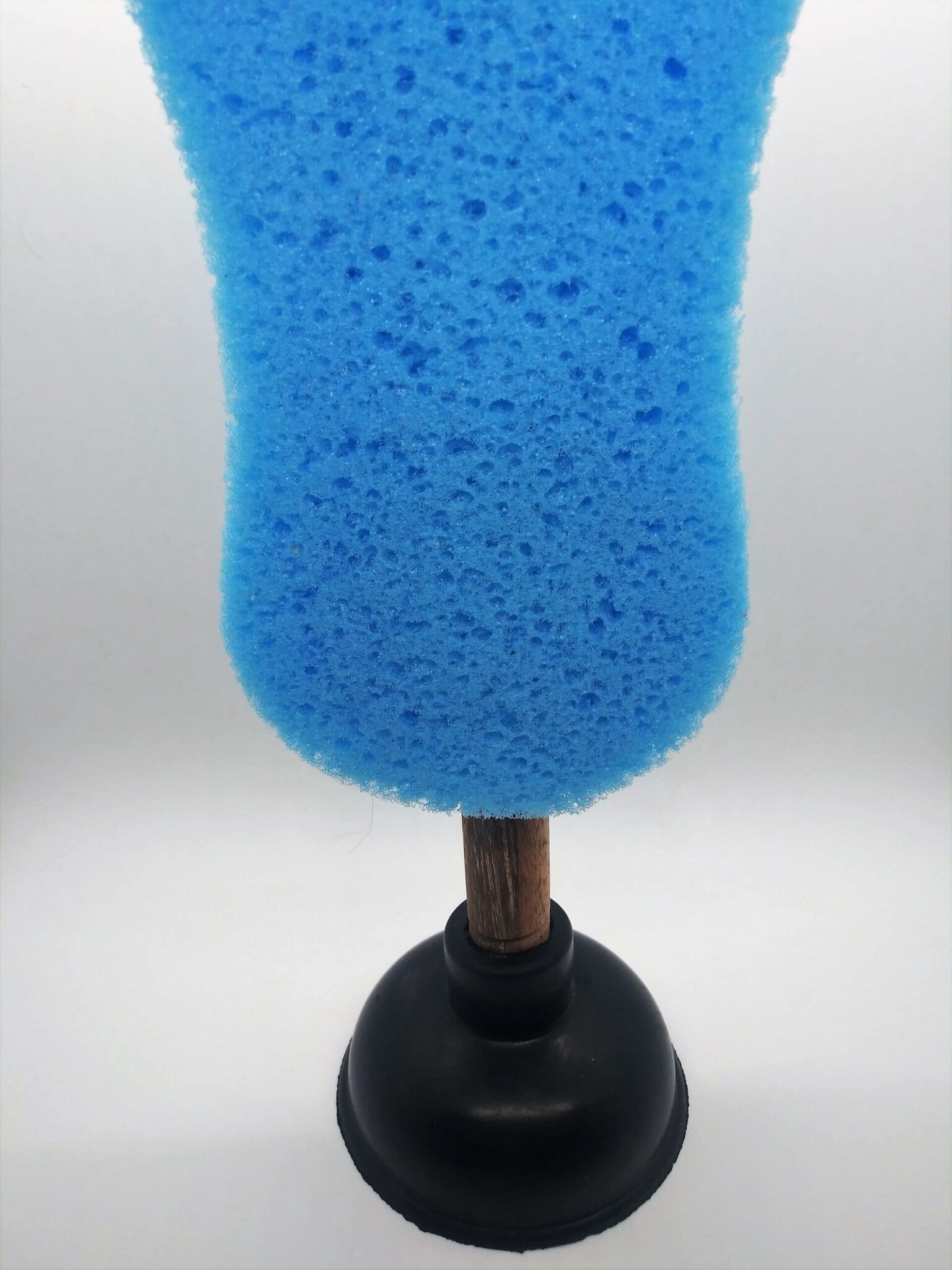 DIY anal sex toys, plunger toy. Photo of a blue sponge covering the handle of a sink plunger.