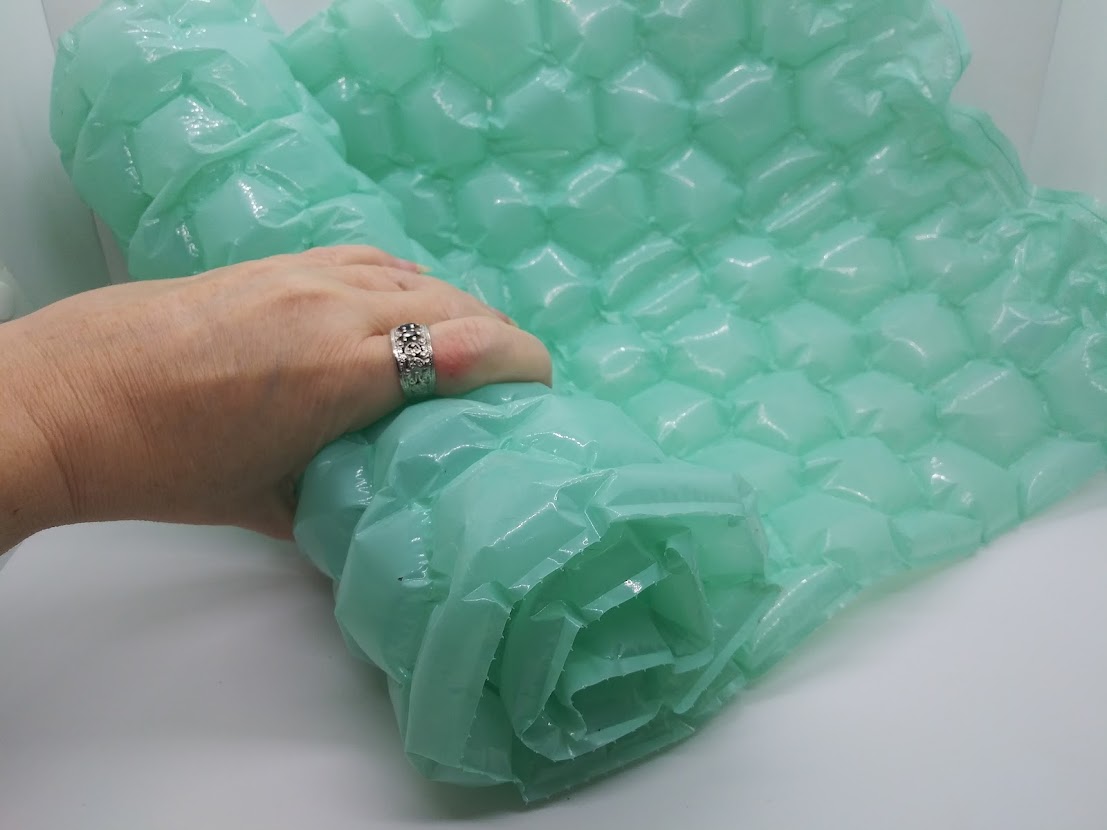 DIY pocket pussy bubble wrap. Showing how to roll the bubble wrap with the pillows inside.