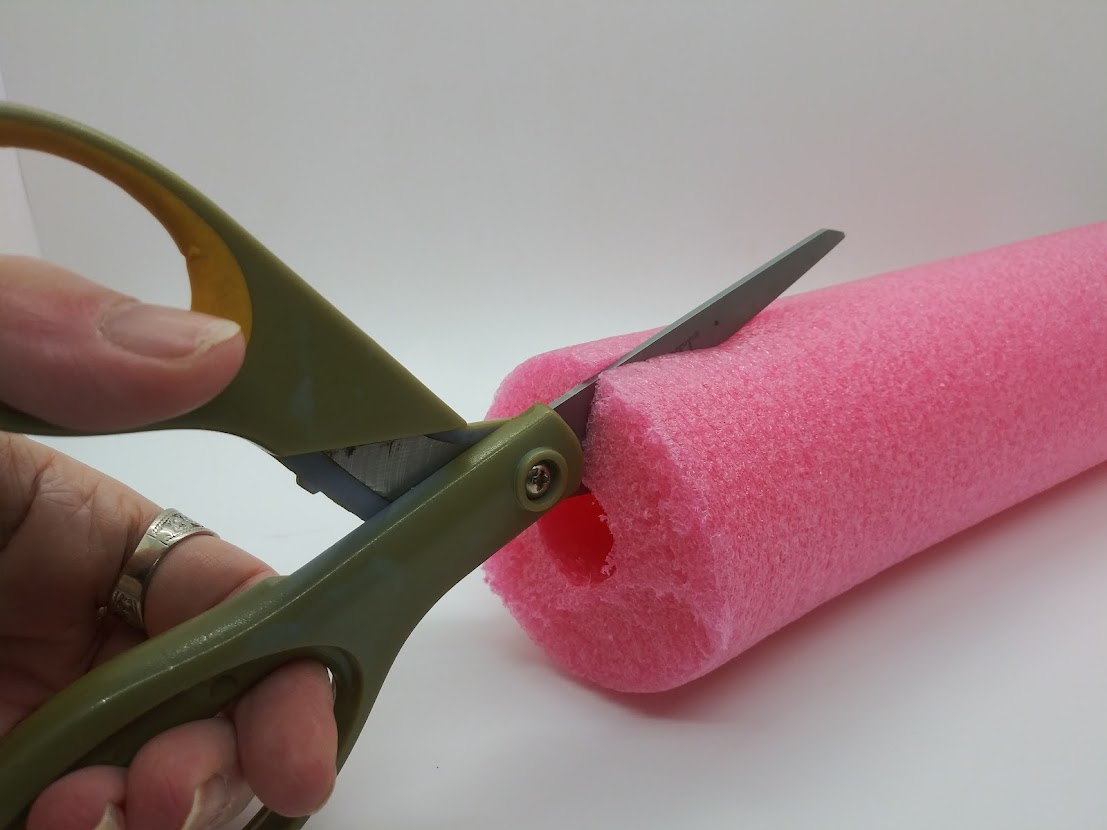 DIY Fleshlight using a pool noodle. Showing how to cut the noodle long ways.