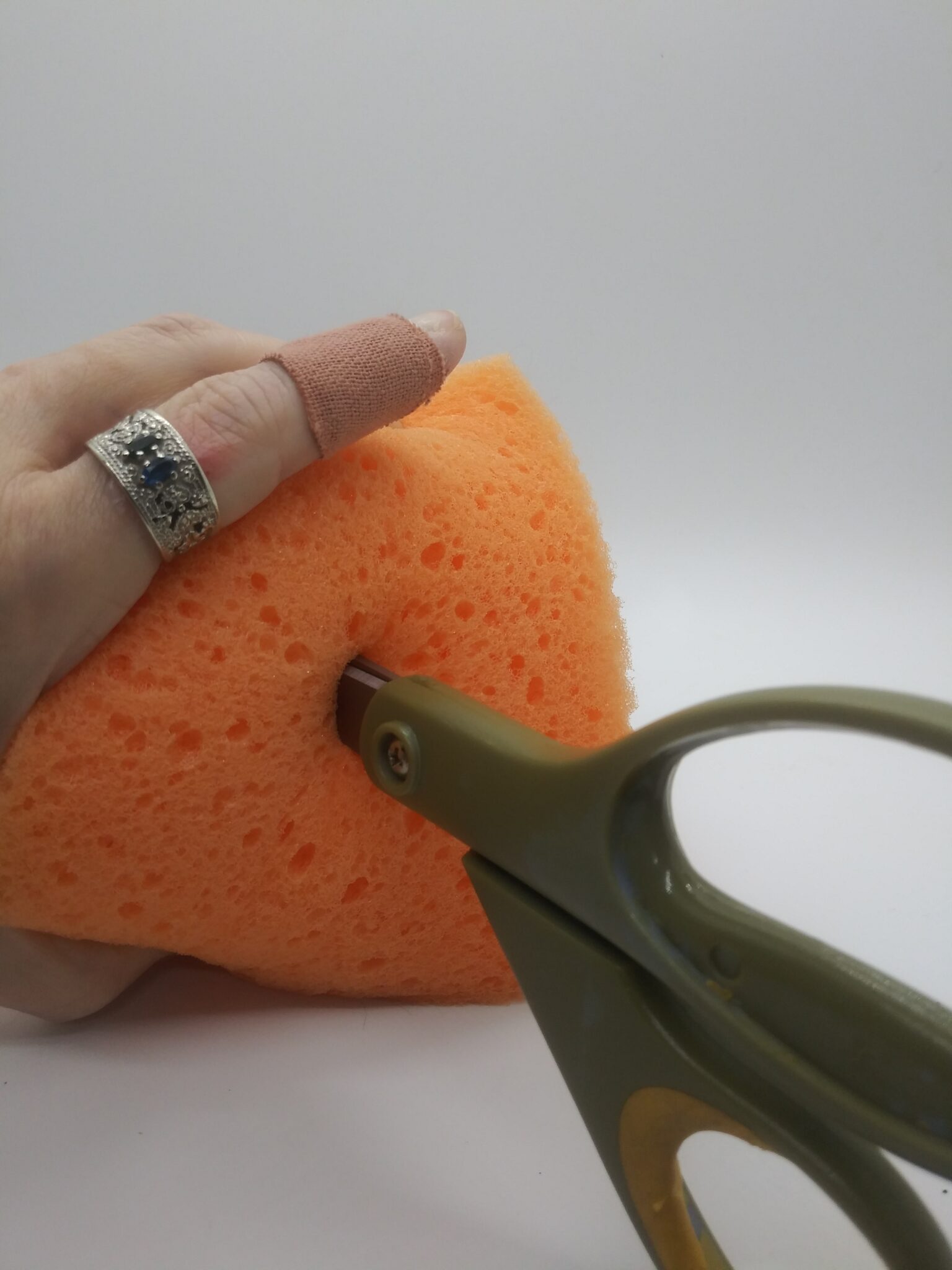 Real Feel DIY Fleshlight showing how to poke a hole in the sponge