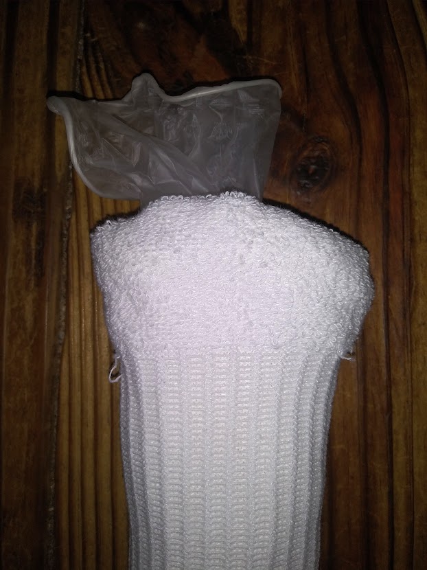 DIY sock pocket pussy. showing glove pushed onside the rolled socks.