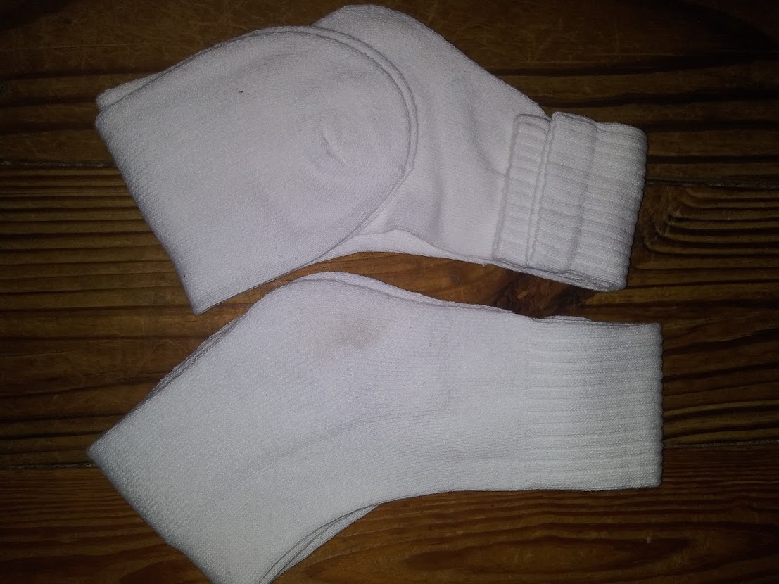 DIY pocket pussy stacked socks. Showing how to fold the socks.