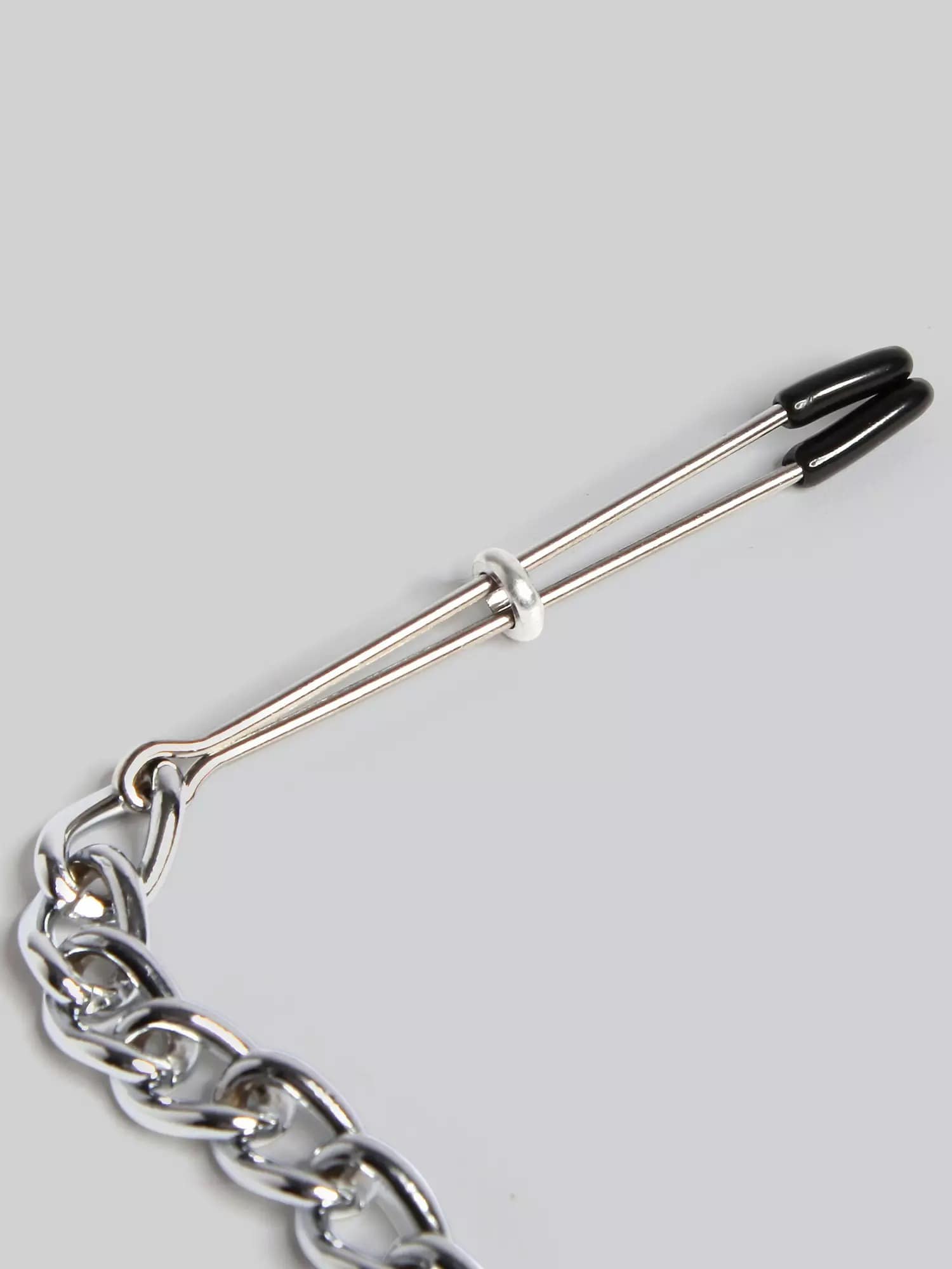 DOMINIX Deluxe Nipple Tweezers and Clit Clamp with Chain. Slide 4