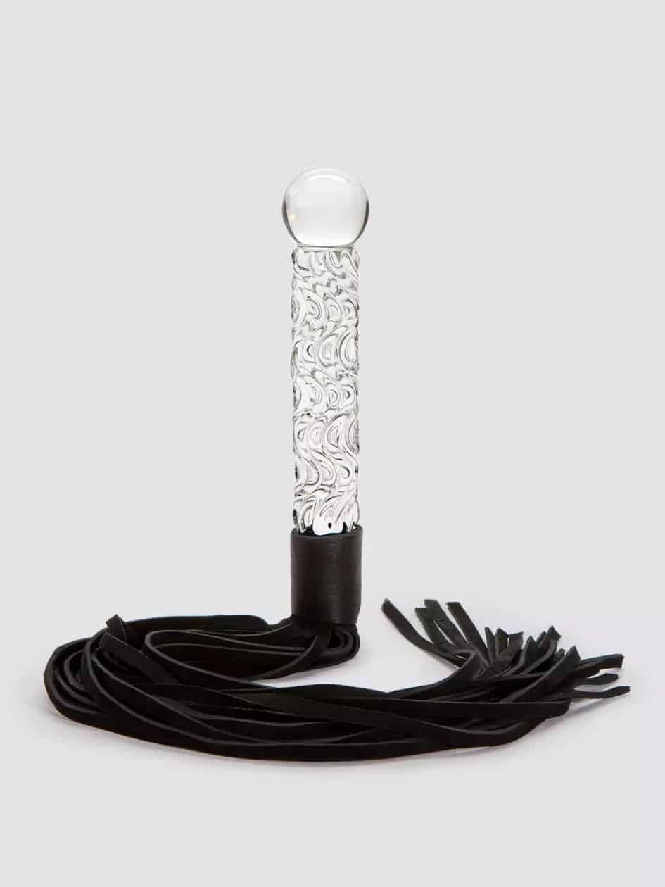 Icicles No 38 Glass Dildo with Leather Flogger. Slide 1