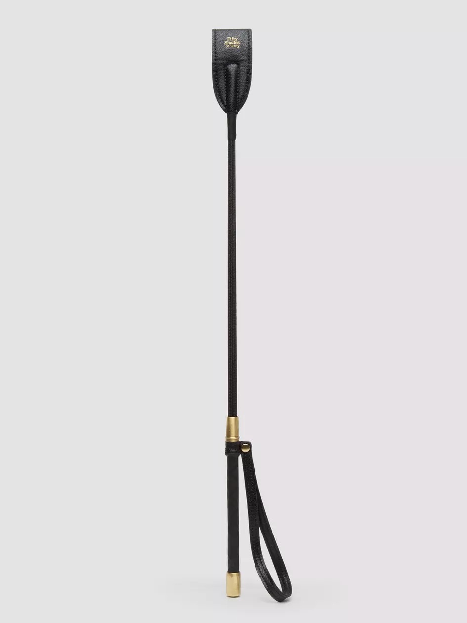 Fifty Shades of Grey Bound to You Faux Leather Riding Crop. Slide 1