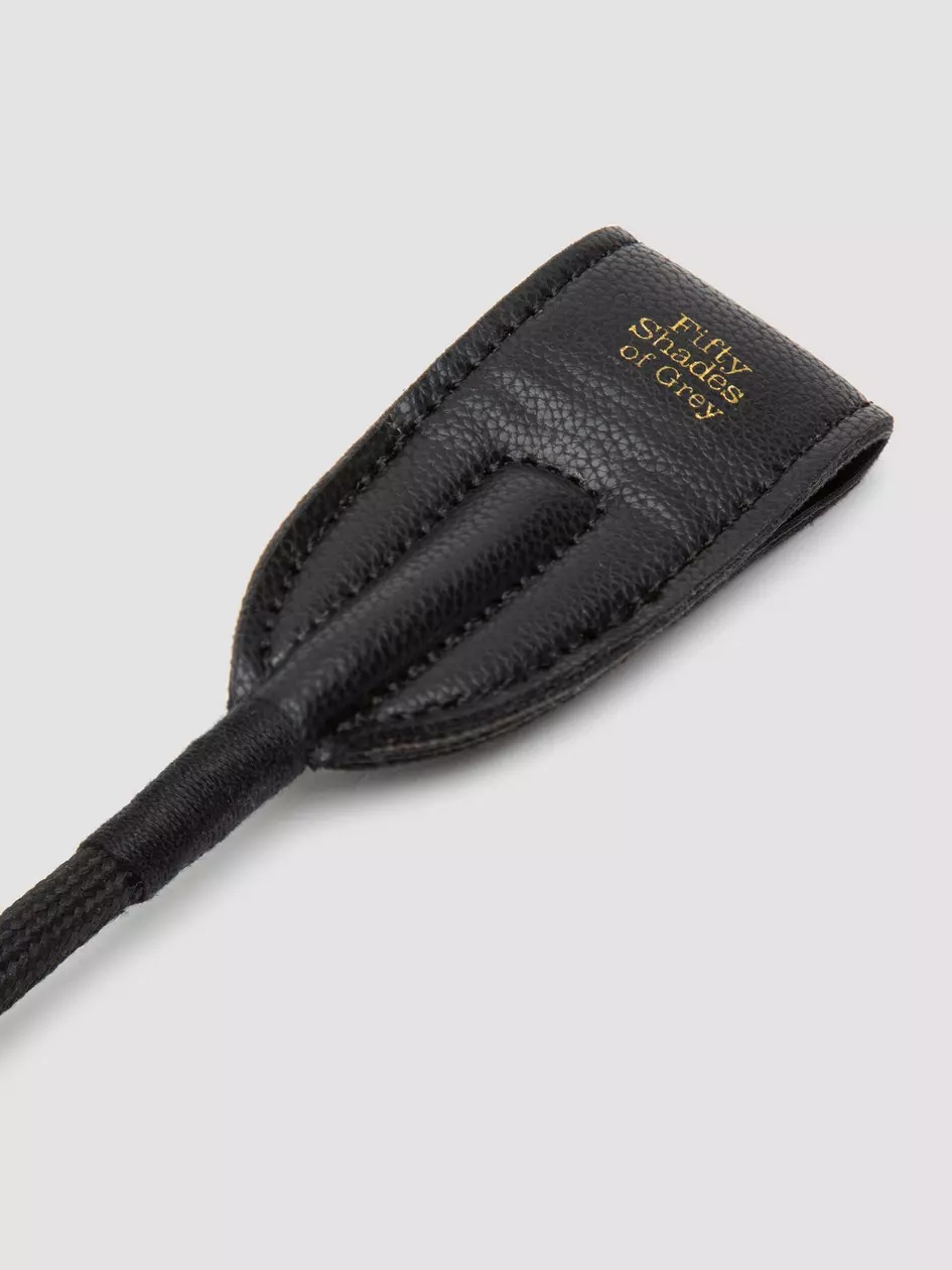 Fifty Shades of Grey Bound to You Faux Leather Riding Crop. Slide 2