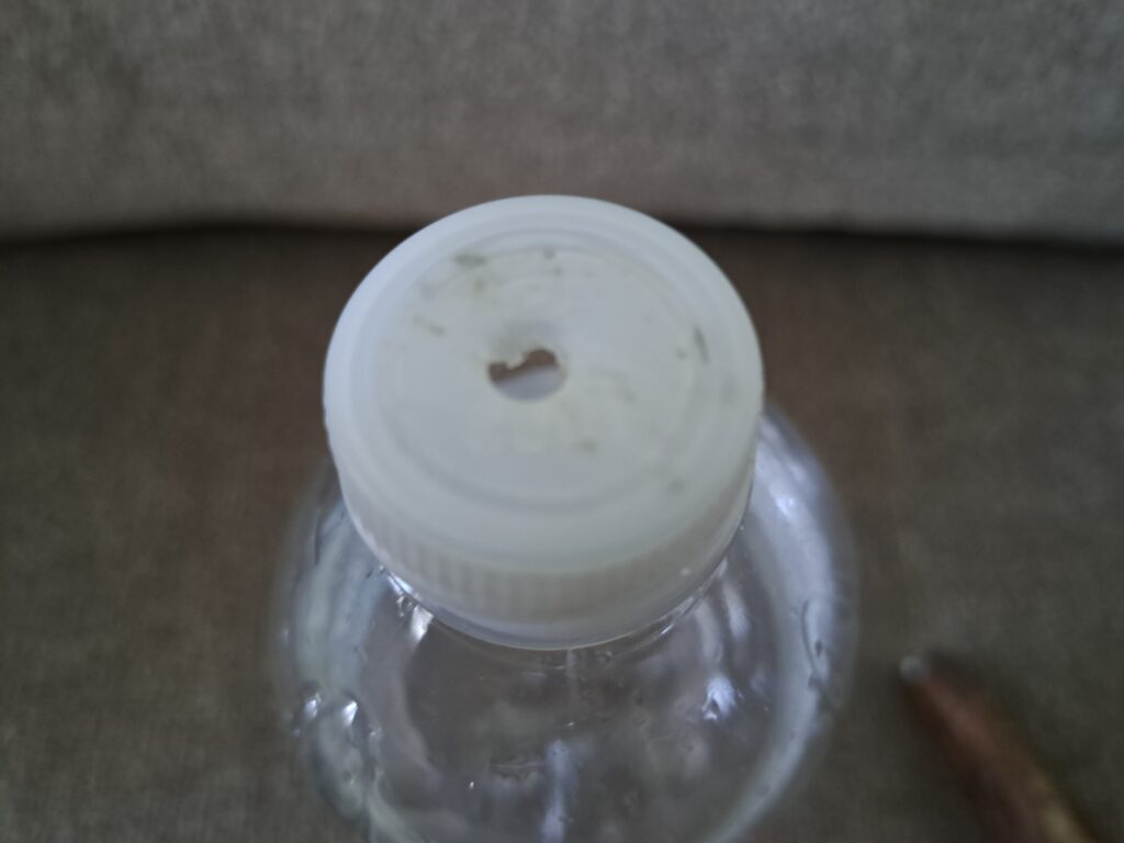 water bottle with hole in cap for homemade anal douche