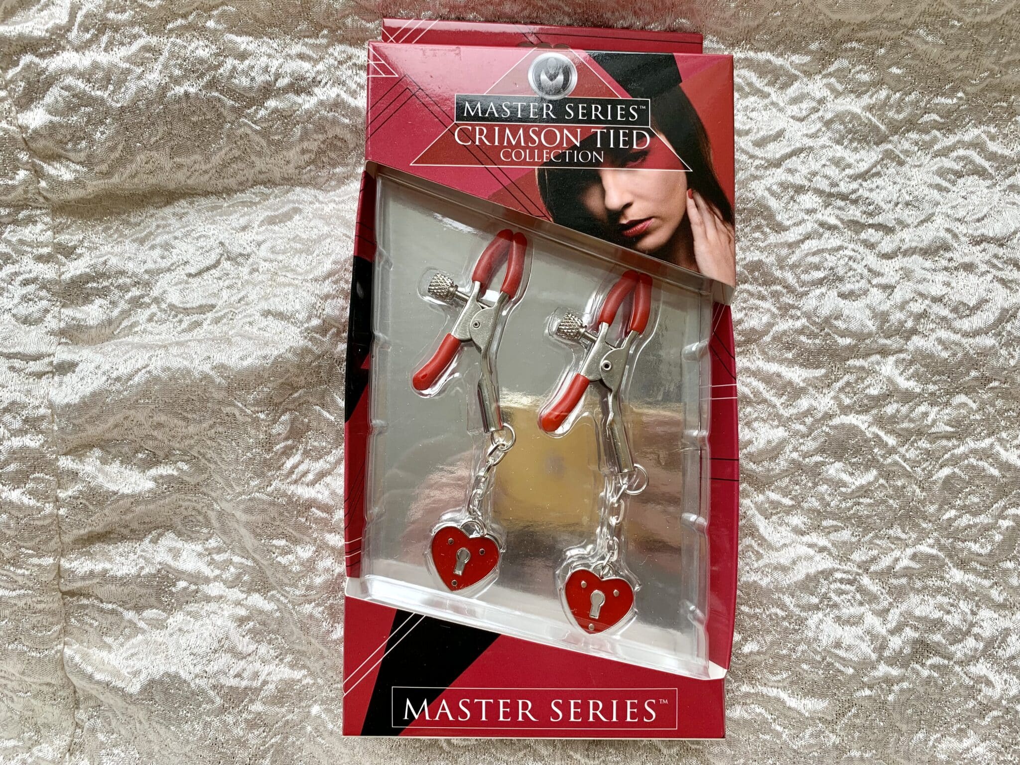 Master Series Captive Heart Padlock Nipple Clamps. Slide 8