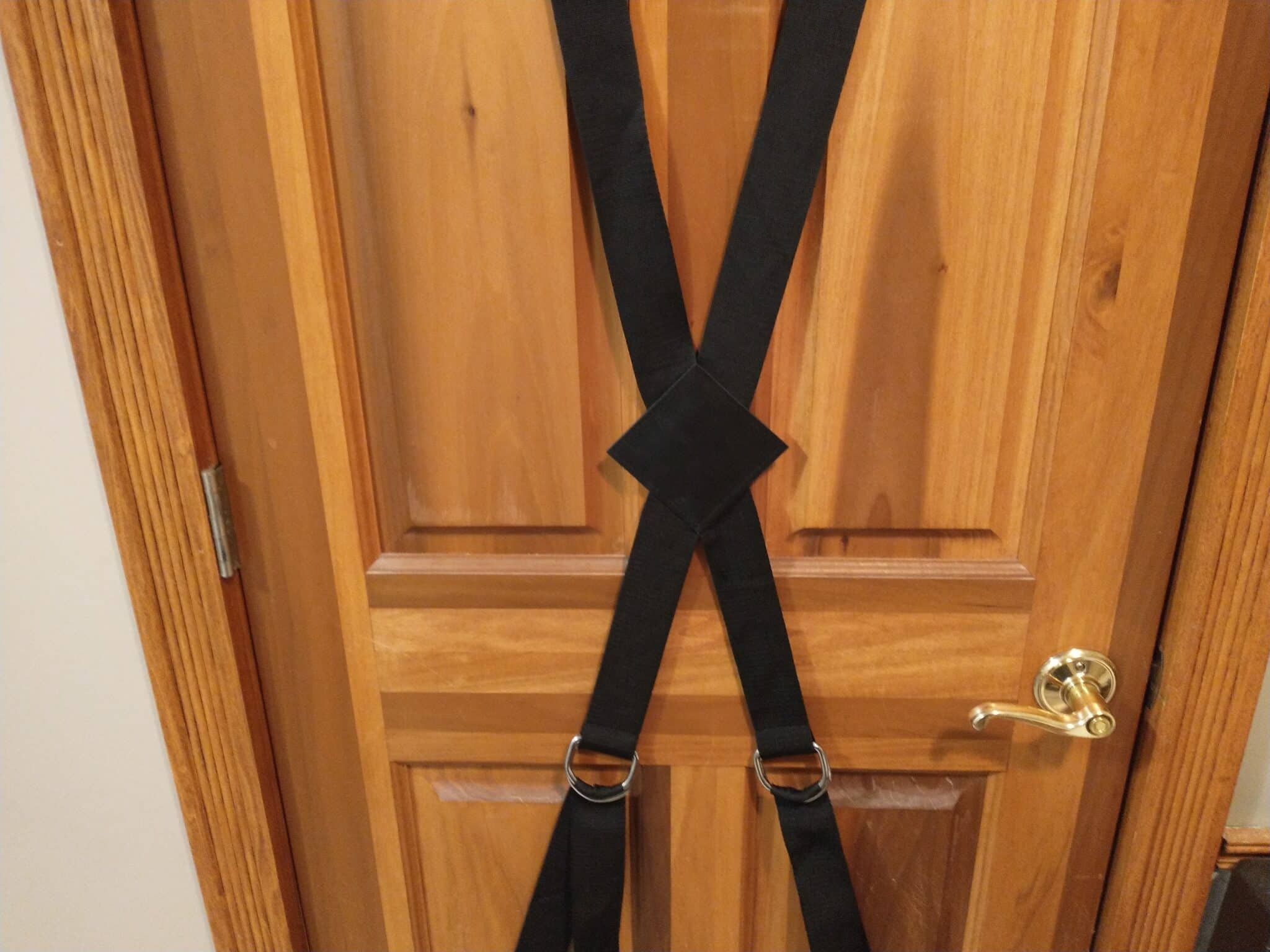 DOMINIX Deluxe Over the Door Cross Restraints Materials and care