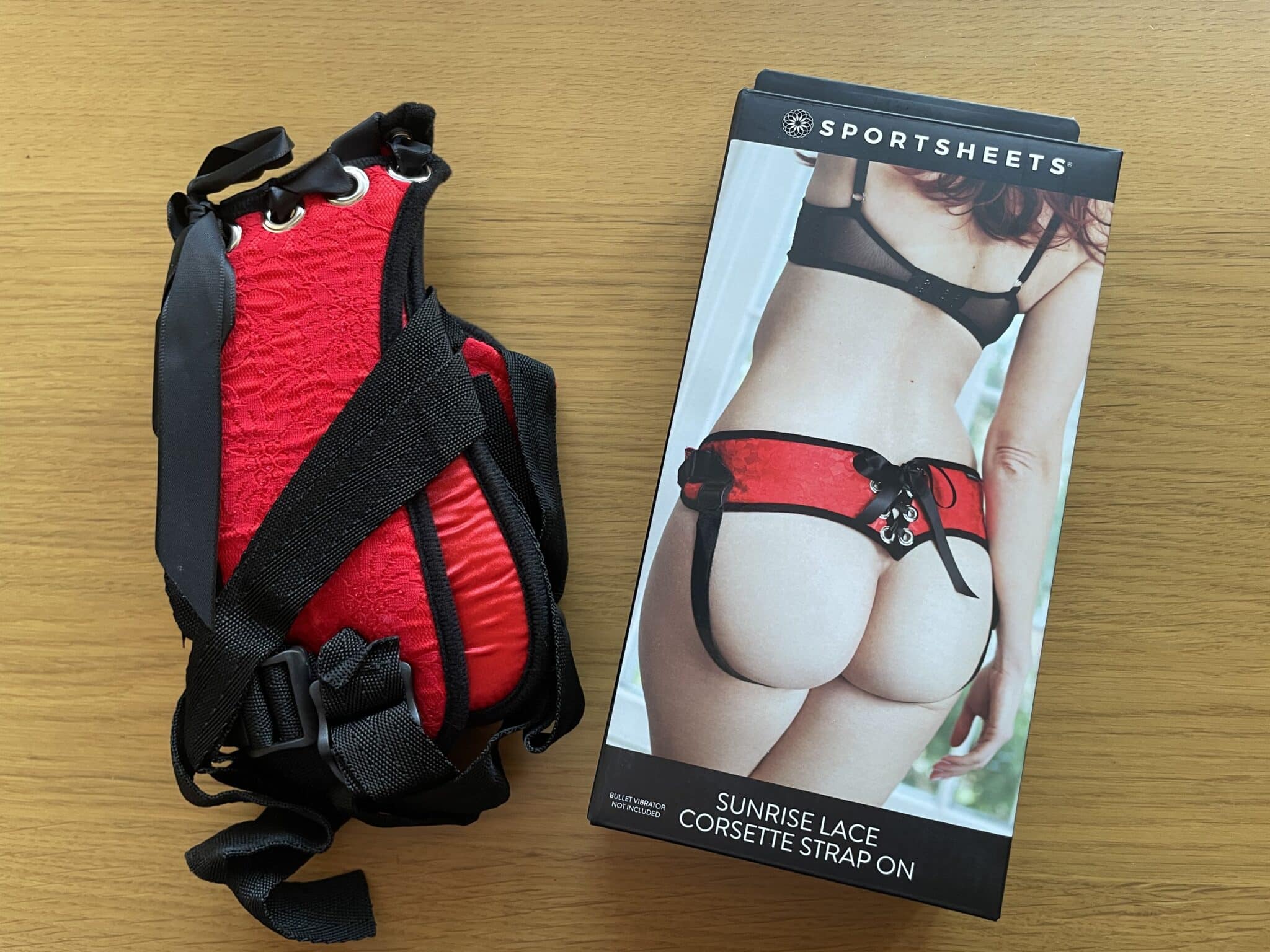 Sportsheets Red Lace Corsette Strap-On Harness Packaging